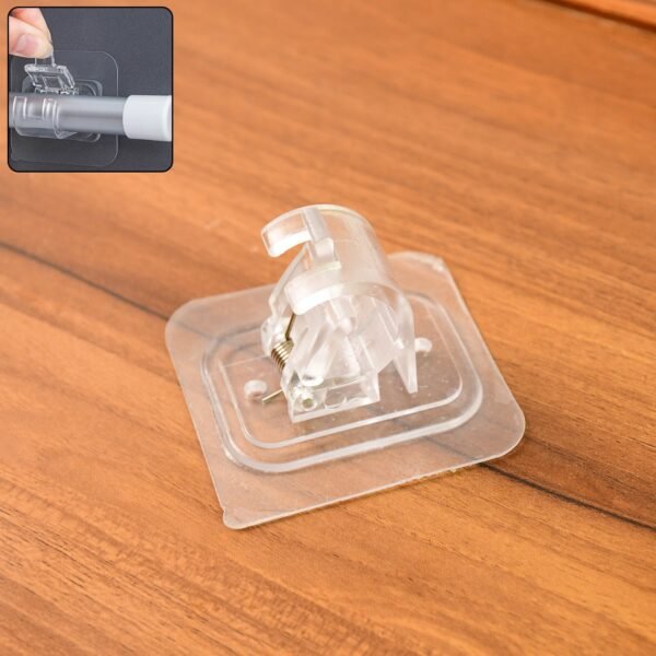 01_83da6a00-e811-4fa9-878c-bf55213d32ca.jpg Wall Mount Transparent Self-Adhesive Clip with Strong Spring Grip
