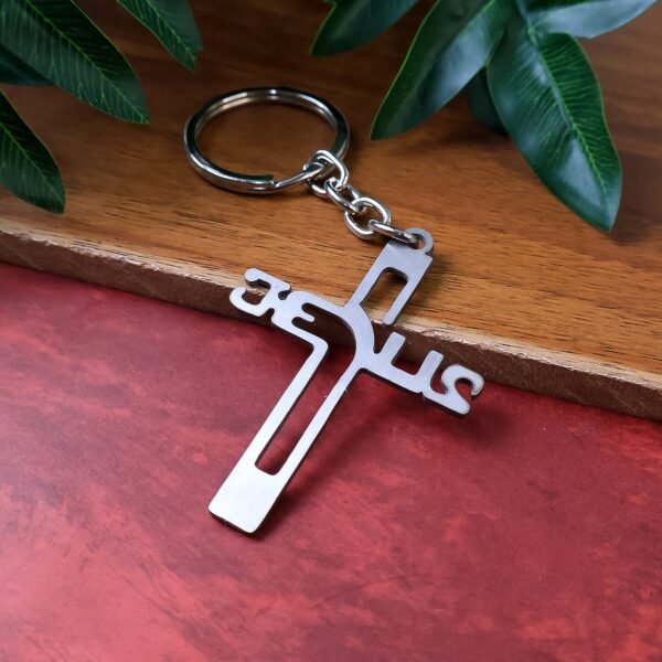 01_c99d06a5-0239-46c0-a1f5-8d394e63ac08.jpg Elegant Metal Cross Keychain with Gujarati "Jesus" Script – Religious Faith Key Ring