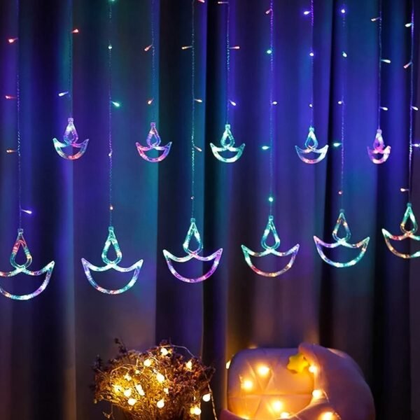 01_e1e5e6f1-5e7a-479c-89d3-80b75f3af114.jpg Multicolor 12 Diya Curtain String Lights (Multi Color)