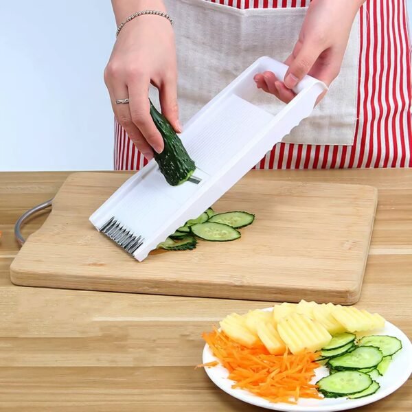 02_0e08e274-d221-4e34-9c0a-1e14811ec355.jpg 3 in 1 Kitchen Set: Grater Base, Slicing Attachment, and Peeler (3 Pcs Set)