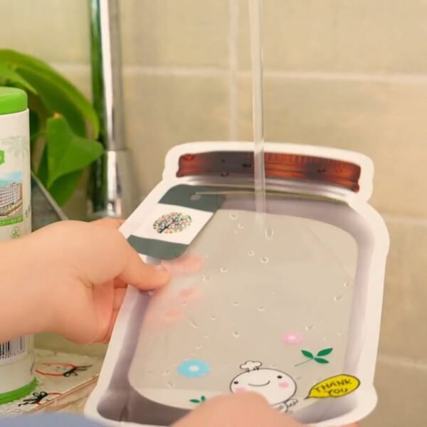 02_4794451f-71bb-4309-a76a-c2e7fee8cb81.jpg Plastic Transparent Medium Jar Shaped Pouch With Zipper (1 Pc)