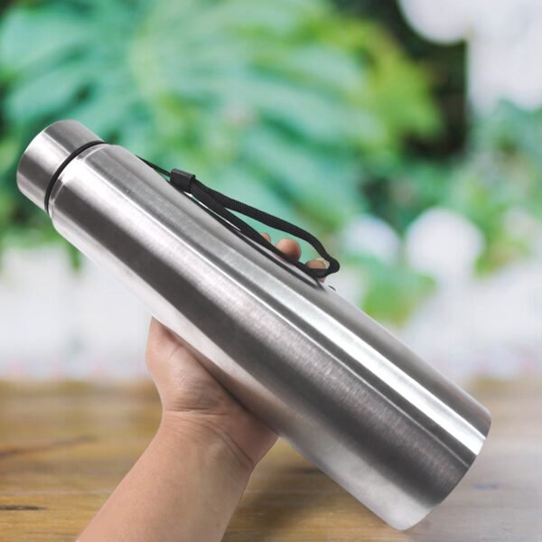 02_81449e1a-6a71-4267-a6ee-12b0e49bf3d9.jpg Stainless Steel Double Wall Vacuum-Insulated Drink Water Bottle (1000 ML)