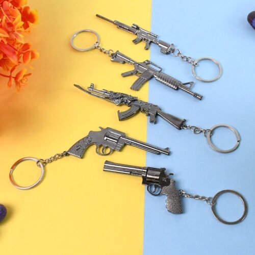 02_ae58eef9-0b4c-4a70-89a1-0e06ef569b18.jpg Mix Design Metal Gun Keychain With Case (1 Pc / Mix Design)