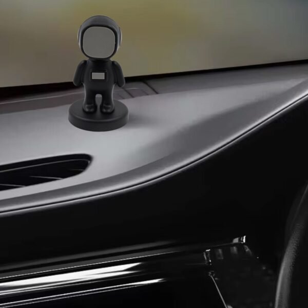 02_c3a2a1d0-1fe4-43f9-b014-6a99c576dfef.jpg Cartoon Astronaut Magnetic Mobile Phone Holder – 360° Rotating Car Mount (1 Pc)