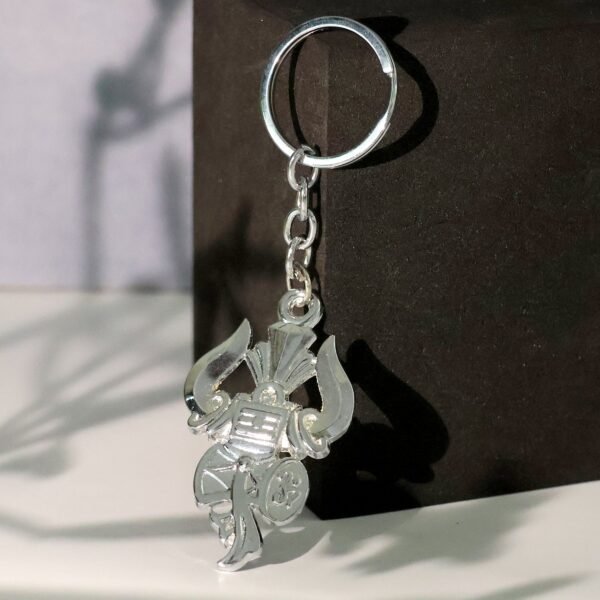 02_c3f7f30b-9a21-4b84-9384-fb957ce01147.jpg Mahakal Trishul Metal Keychain Set (2 Pc Mix Design)