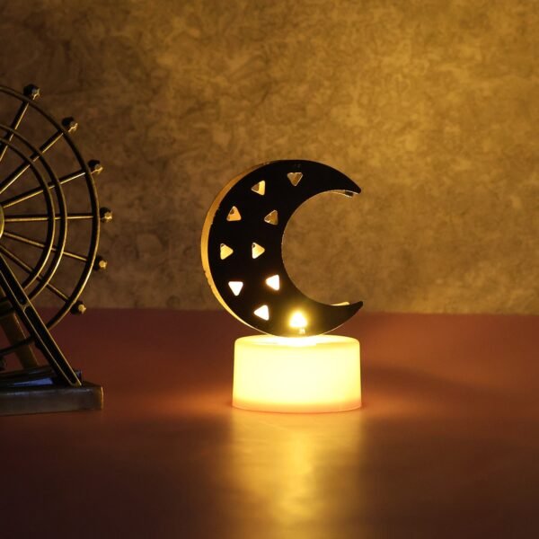 02_e88dcfad-25c5-47f6-b71d-5a9fde00ca2e.jpg Decorative Moon Shaped Flameless LED Candles (4 Pc)