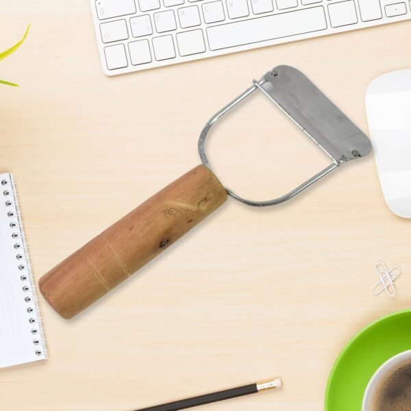 02_f9b5a639-a200-4bf8-8576-b2c3227e148c.jpg Wooden Handle Metal Vegetable Cutter, Peeler, Slicer (1 Pc / B Grade)