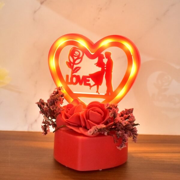 03_45148471-3399-4c41-b78b-fb76292a2c6f.jpg Romantic Heart-Shaped Love Couple Decorative Showpiece with Rose Base (1 Pc)
