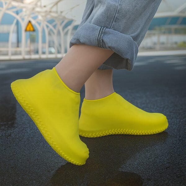 03_8ef9fa9e-ba48-4459-aaca-290935ca6740.jpg Yellow Non-Slip Silicone Rain Shoe Cover – Waterproof Foldable Anti-Skid (1 Pair)