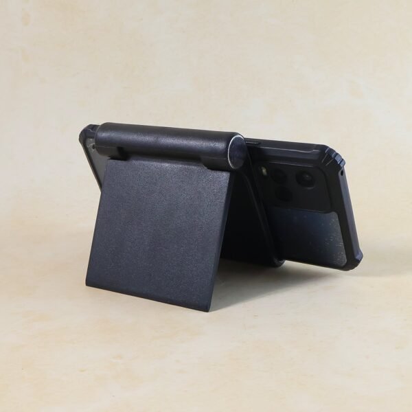 03_f2326c21-e498-495c-9645-170a0504ed76.jpg Plastic Foldable Desktop Mobile Stand (1 Pc / Black)
