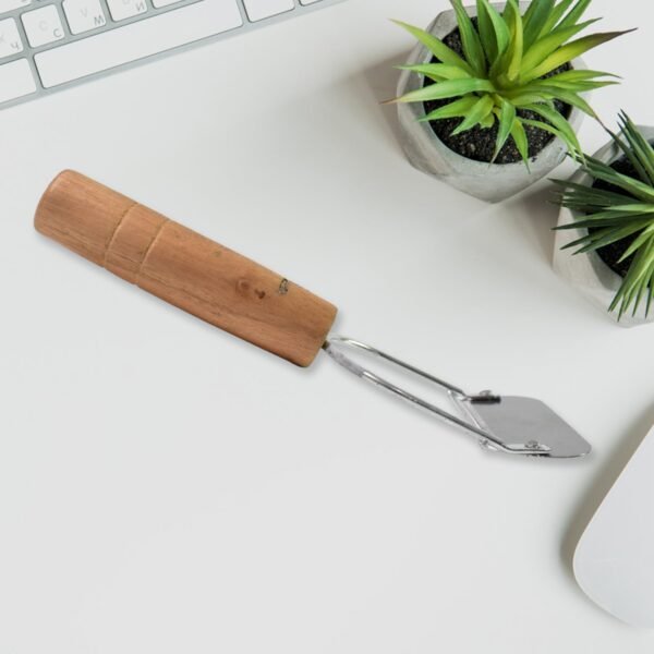 03_f2f15fc1-e888-4bc7-bb1c-59328a3e79b6.jpg Wooden Handle Metal Vegetable Cutter, Peeler, Slicer (1 Pc / B Grade)