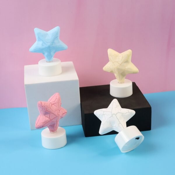 04_611eeabc-899a-425f-8d5e-75e31c4345ca.jpg Star Shape Decorative LED Tealight Candles (4 Pc)