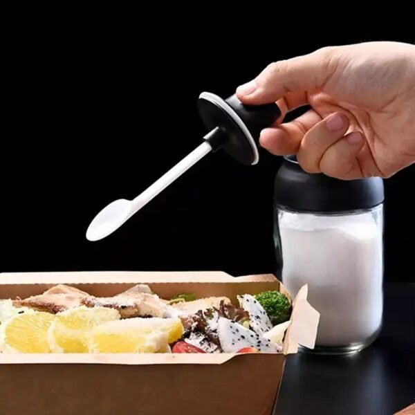 04_e1fa7616-8b9c-4de7-849e-17f8faec1649.jpg All-in-One Seasoning Jar: Heat-Resistant Glass with Spoon (1 Pc)