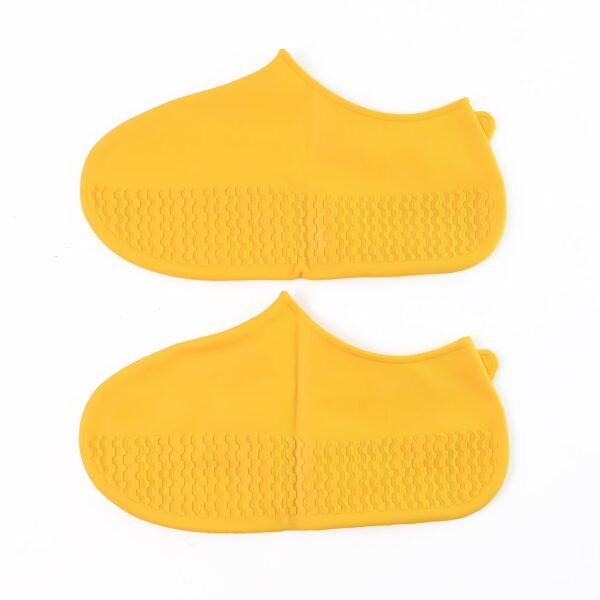 05_4afce091-c1f1-4aae-ab3a-54c7f5c491d9.jpg Yellow Non-Slip Silicone Rain Shoe Cover – Waterproof Foldable Anti-Skid (1 Pair)