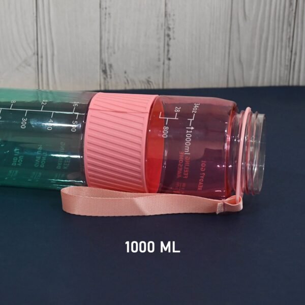 05_a2defc21-916c-41fd-8f40-c4cfca3c88c0.jpg Plastic Water Bottle With Strap and Straw (1000 ML)