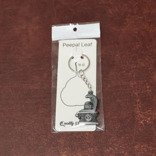 06_434cb1f4-2074-46aa-9194-4c808d037b42.jpg Shivling with Snake Design Silver Keychain (1 Pc)