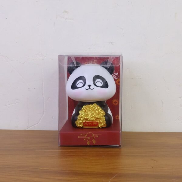 06_4de9f2c6-5e5b-48ee-8c5b-0aba41fba761.jpg Solar Powered Moving Panda Car Dashboard Decoration – 1 Pc