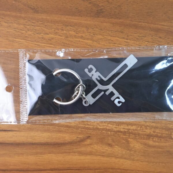 06_faea9059-21a1-4100-8778-05efc857d899.jpg Elegant Metal Cross Keychain with Gujarati "Jesus" Script – Religious Faith Key Ring