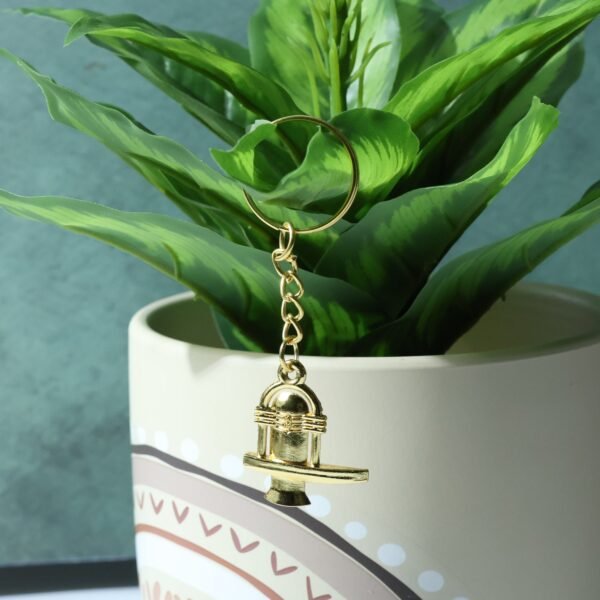 06_keychain_63c69864-de8d-4e65-a508-3f6913fc817c.jpg Shivling Golden Metal Keychain (1 Pc)