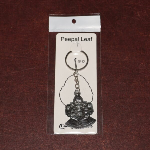 07_03db1ef4-79b5-45af-84e7-a630444500a3.jpg Lord Ganesha Sitting Design Silver Keychain (1 Pc)