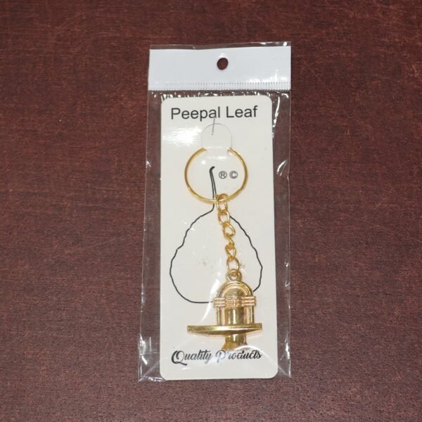 07_keychain_ed9bbfbf-78d8-47db-8360-e07e7383f3d4.jpg Shivling Golden Metal Keychain (1 Pc)