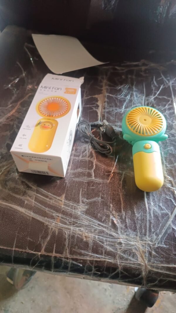 0a97cc3c-00da-447e-a958-b23aed8a2821.jpg Rechargeable Mini Handheld Fan (1 Pc)