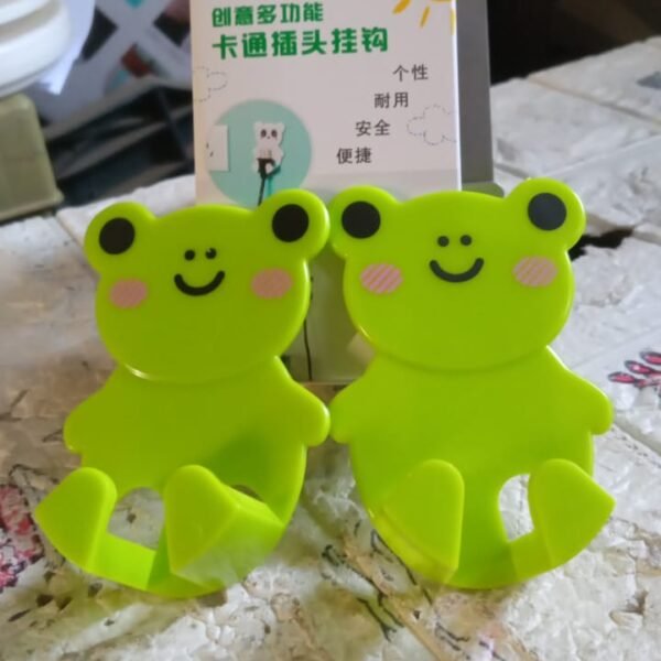 0b2b1139-4afb-47ff-ba86-3656100b5fba.jpg Plastic Adhesive Cable & Socket Holder – 2-Piece Set for Office, Home & Restaurant