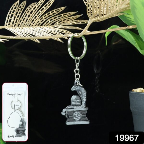 13_accb3917-aa8f-42aa-80f8-2f7c1948f580.jpg Shivling with Snake Design Silver Keychain (1 Pc)