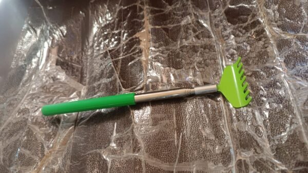 145a7197-a7a2-4b55-b582-673edced1e0f.jpg Khujli Stick – 57 cm Long Telescopic Back Scratcher (1 Pc)