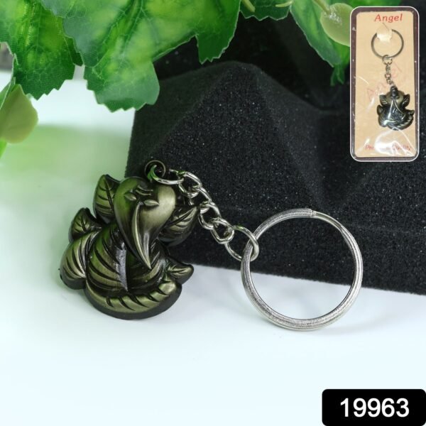 15_4caef8a4-c3b4-4eb7-9c6e-e54feffbe8c0.jpg Ganesh Face Antique Black Metal Keychain (1 Pc)