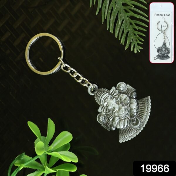 17_2a9928c2-4268-455d-8f31-da42482d9612.jpg Lord Ganesha Sitting Design Silver Keychain (1 Pc)