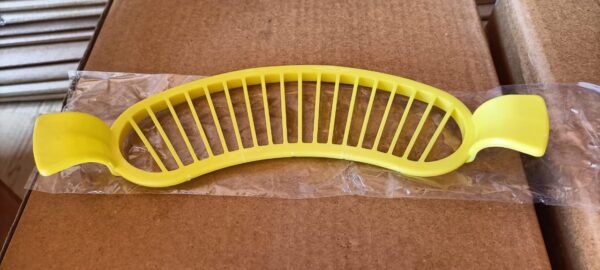 1a0d8b5e-10e1-4a89-8f57-b79ee73f813f.jpg Plastic Banana Slicer / Cutter With Handle