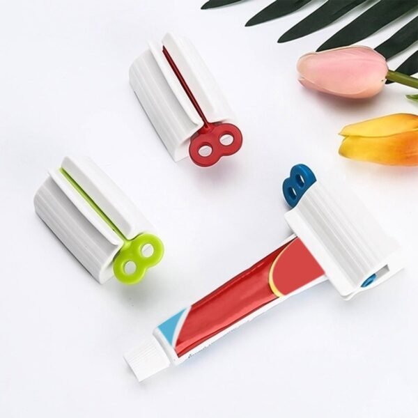 251406.jpg Rolling Tube Toothpaste Squeezer Toothpaste Seat Holder Stand