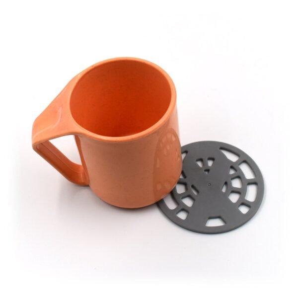 2600_3_e6d0175b-0284-4106-8bea-67162fa74744.jpg 1Pc Silicone Fancy Coaster holding bowls and utensils including all kitchen purposes.