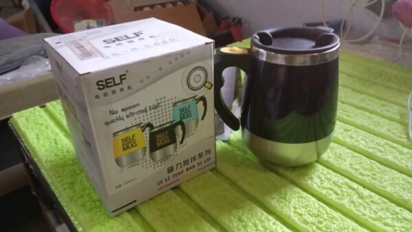 29e6d362-2239-48d0-b66e-a06d8d4421b9.jpg Self Stirring Mug With Lid used in official places for serving drinks (1 Pc / 400 ML)