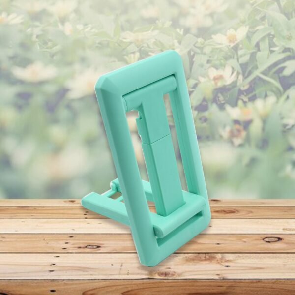 3_9565265e-7b54-4c3f-8ac9-5222b6b9c274.jpg Adjustable Foldable Mobile Stand – Non-Slip, Sturdy for Smartphones