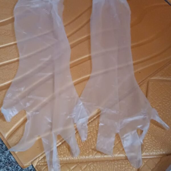 3d8d7450-89d2-4f6f-a568-0210849cffc6.jpg Disposable Plastic Gloves For Kitchen Food Handling (1 Pair)