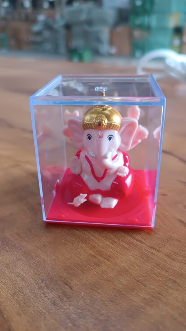 4e7bae10-0af7-4281-afff-cf179692ef37_f9c11c05-90dc-4d2f-8ee8-4bba2798972a.jpg Decorative Small Lord Ganesh Idol in Transparent Case (1 Pc)