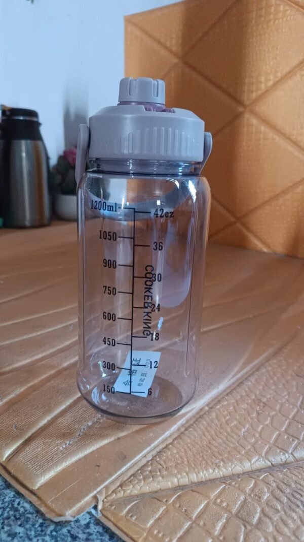 4e9d7e07-129f-47ea-8a4d-0d7518c5f8a6.jpg Plastic water bottle With Carry Handle (1 pc / 1200 ML)