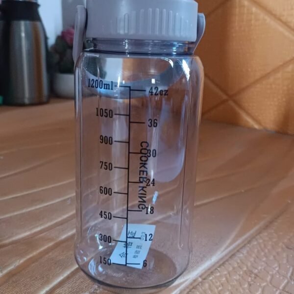 4e9d7e07-129f-47ea-8a4d-0d7518c5f8a6.jpg Plastic water bottle With Carry Handle (1 pc / 1200 ML)