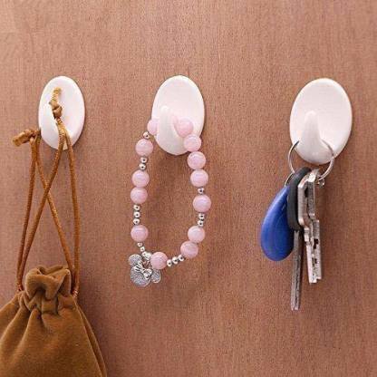 5-pcs-self-adhesive-wall-hook-key-towel-hook-plastic-sukot-original-imafxqz4uc3yyfvv.jpg Self Adhesive Plastic Wall Hook Set for Home Kitchen and Other Places (Pack of 9)