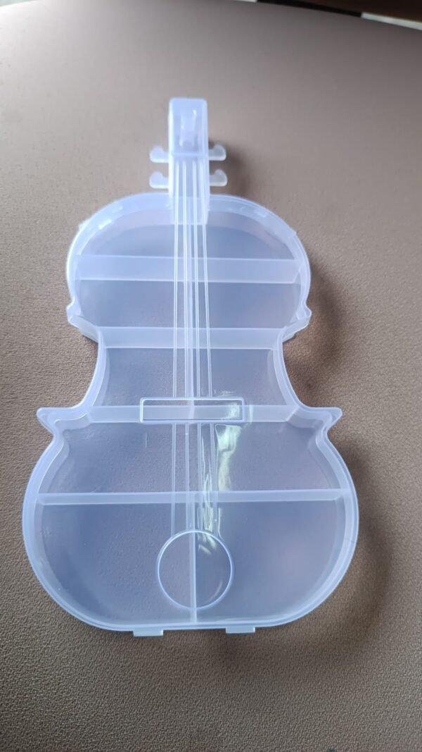 54d1b2e2-167b-4c90-bb14-9df07258d4d8.jpg Violin Shape Plastic Storage Box (1 Pc)