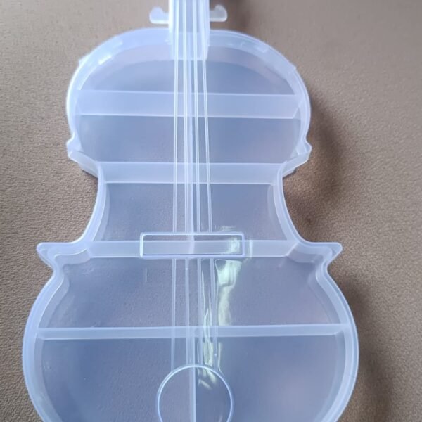 54d1b2e2-167b-4c90-bb14-9df07258d4d8.jpg Violin Shape Plastic Storage Box (1 Pc)