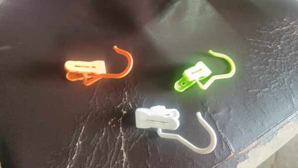 66b31ebc-5e69-4952-88dc-382c1dc48daa.jpg Multipurpose Hanging Hook Clip (1 Pc, Mix Color)