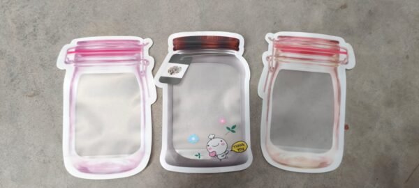 66d732de-3146-478e-8fdc-0bcb0947e784.jpg Plastic Transparent Medium Jar Shaped Pouch With Zipper (1 Pc)
