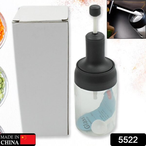 71a5c688-15a3-4492-bca1-53846c71abaa.jpg All-in-One Seasoning Jar: Heat-Resistant Glass with Spoon (1 Pc)