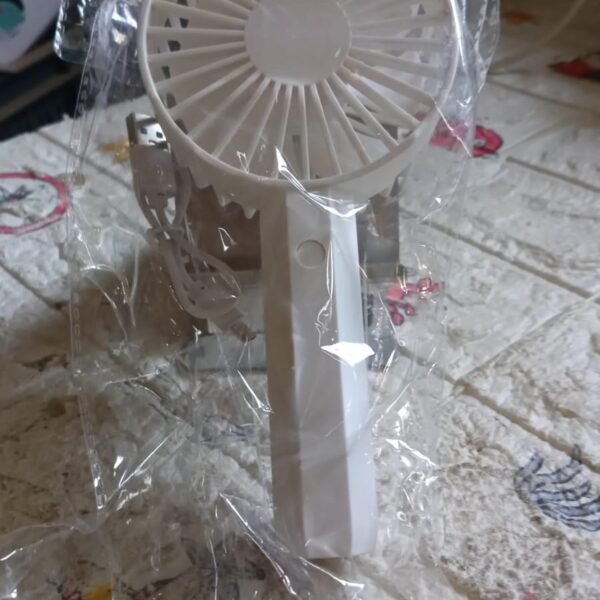 8861b5ec-faf6-465d-976d-becb6d2a2a5f_94cbec26-eb21-4272-a2e6-69a9fa32602a.jpg Mini Rechargeable Fan – Lightweight & Easy Carry (1 Pc | Battery Not Included)
