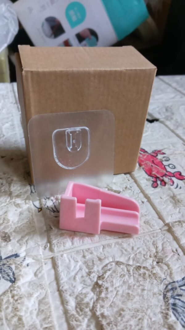 8e860391-d94b-4763-9ae4-f229d0c7c4bb.jpg Punch-Free Wall Hanging Knife Holder – Kitchen Storage Rack (1 Pc)