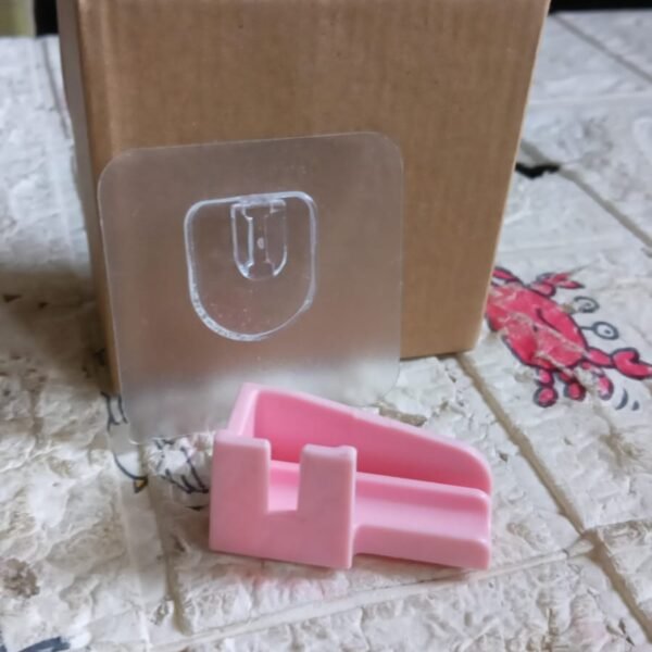 8e860391-d94b-4763-9ae4-f229d0c7c4bb.jpg Punch-Free Wall Hanging Knife Holder – Kitchen Storage Rack (1 Pc)