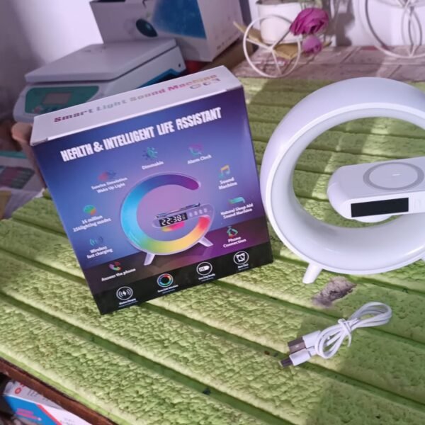 916c98d4-8e67-4211-8962-d454c8bb3c11.jpg Smart Alarm Clock with G-Shape RGB Light Bluetooth Speaker, Wireless Charging (1 Pc)